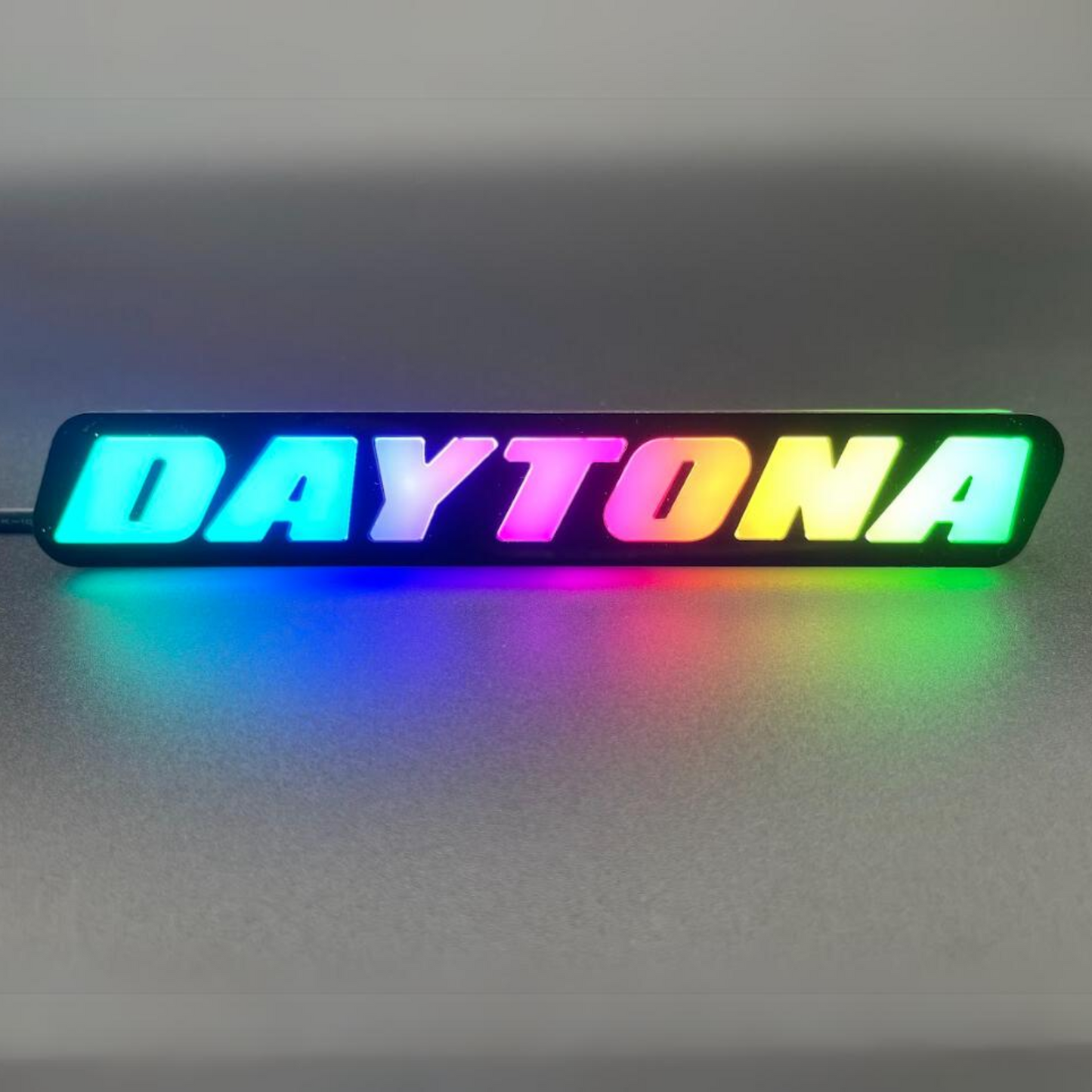 Daytona LED Badge: (Multicolor Flow)