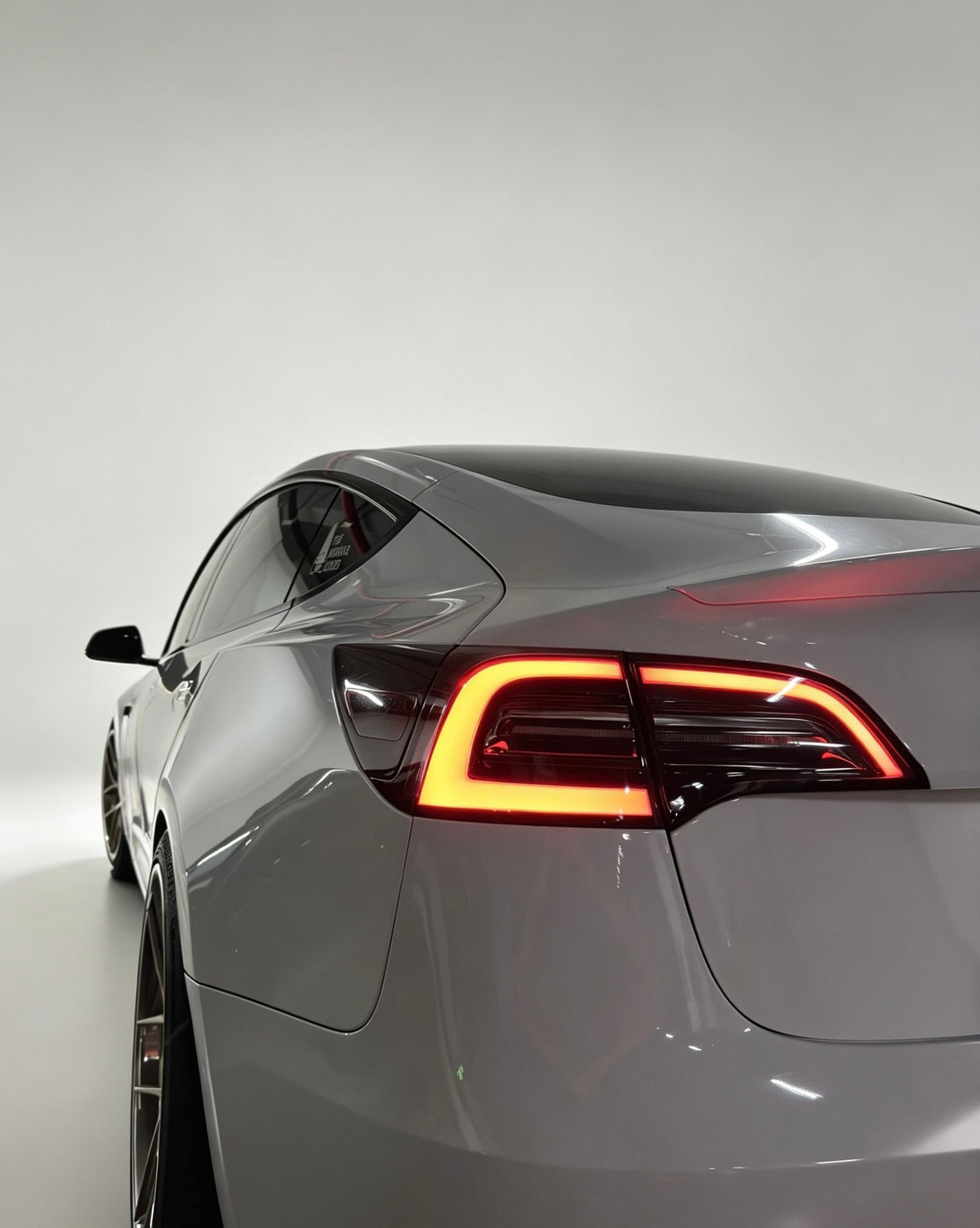Tesla (Previous Gen) clear white-housing tail lights by JIEAN Lights – photo 2