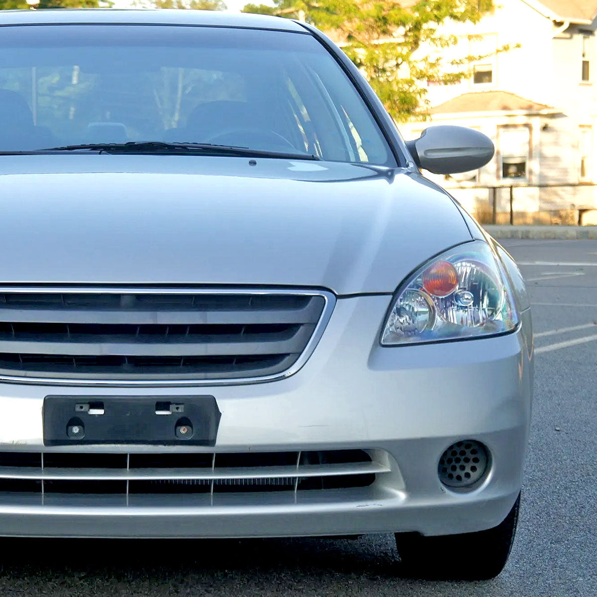 2002-2004 Nissan Altima Crystal Headlights w/ Amber Reflector (Chrome Housing/Clear Lens)