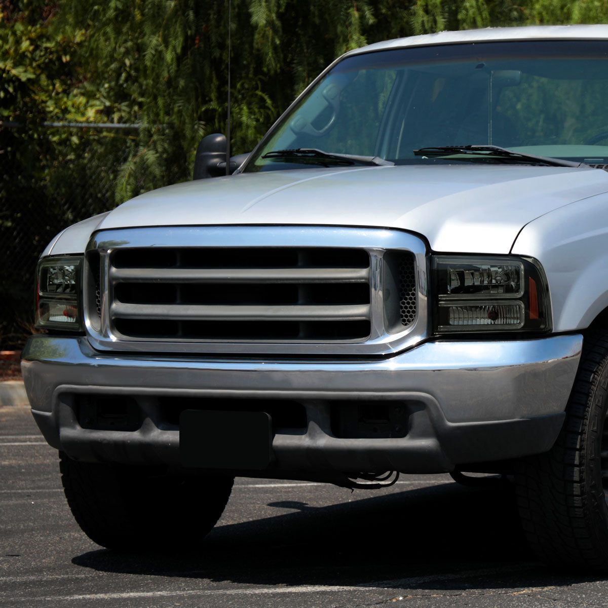 1999-2004 Ford F-250/F-350/F-450/F-550/2000-2004 Excursion Euro Factory Style Headlights with Dual LED C-Bar & Amber Reflectors (Jet Black Housing/Smoked Lens)