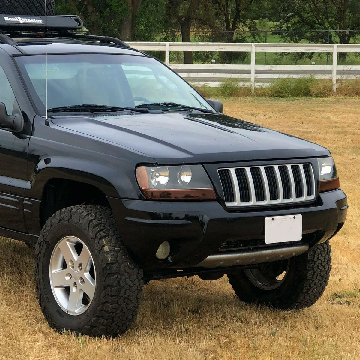 1999-2004 Jeep Grand Cherokee Factory Style Crystal Headlights (Matte Black Housing/Clear Lens)