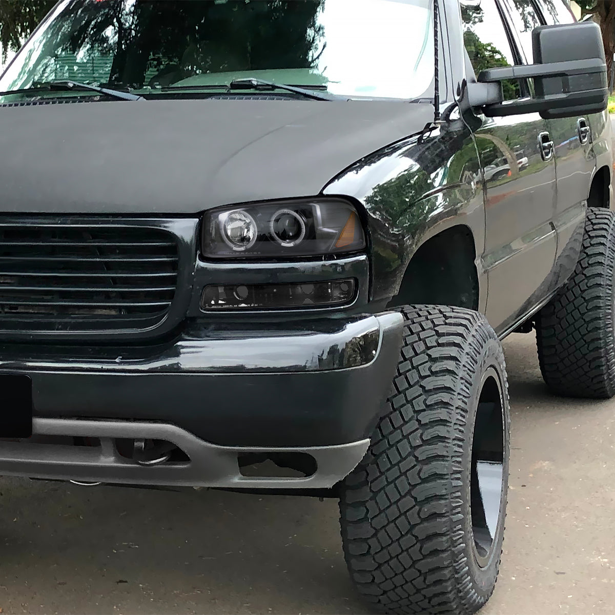 1999-2006 GMC Sierra/Yukon/Yukon XL Dual Halo Projector Headlights (Jet Black Housing/Clear Lens)