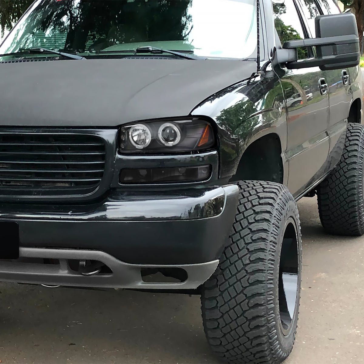 1999-2006 GMC Sierra/Yukon/Yukon XL Dual Halo Projector Headlights (Matte Black Housing/Clear Lens)