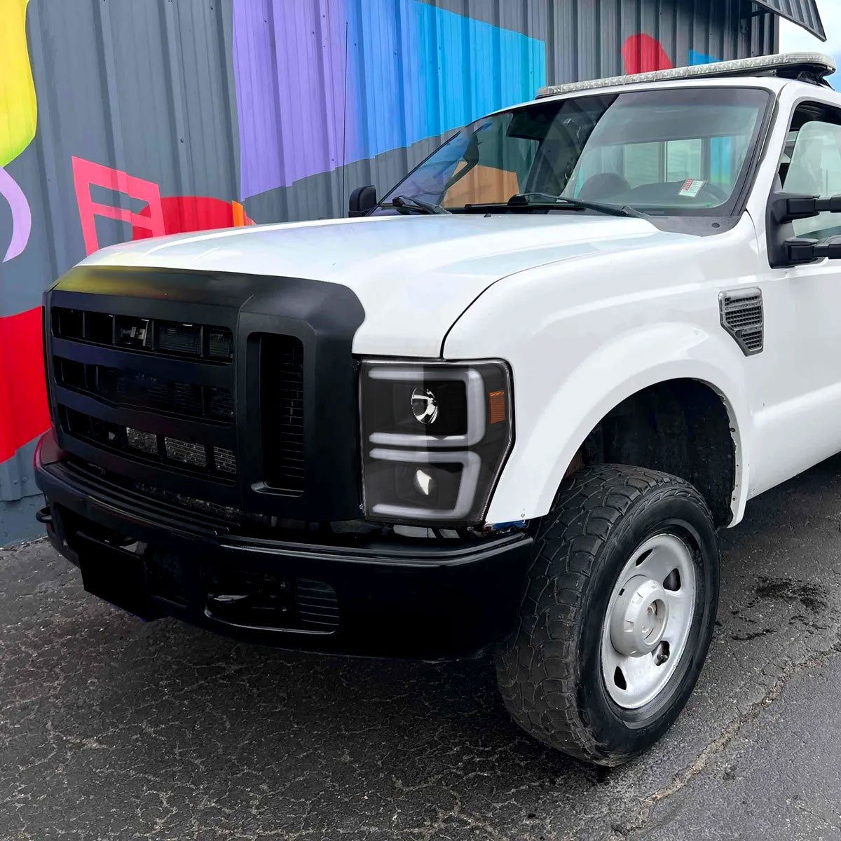 2008-2010 Ford F-250/F-350/F-450/F-550 LED Sequential Turn Signal Bar Projector Headlights (Matte Black Housing/Clear Lens)