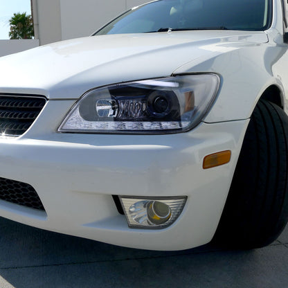 2001-2005 Lexus IS300 Projector Headlights w/ LED Light Strip & LED Turn Signal Lights (Glossy Black Housing/Smoked Lens)