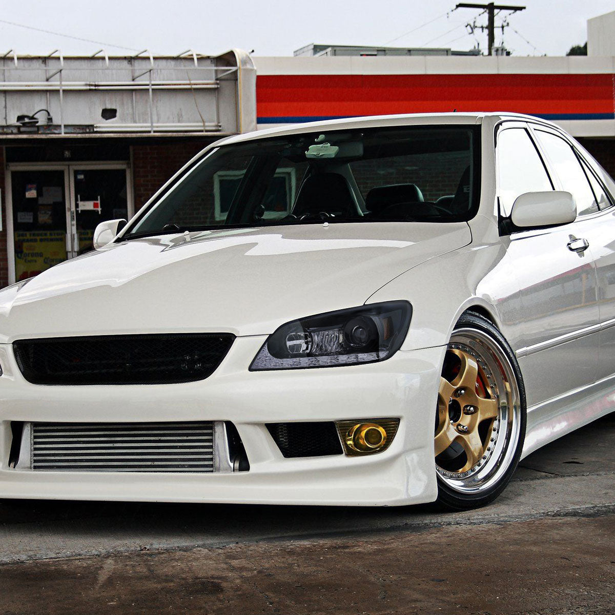 2001-2005 Lexus IS300 Projector Headlights w/ LED Light Strip & LED Turn Signal Lights (Glossy Black Housing/Smoked Lens)