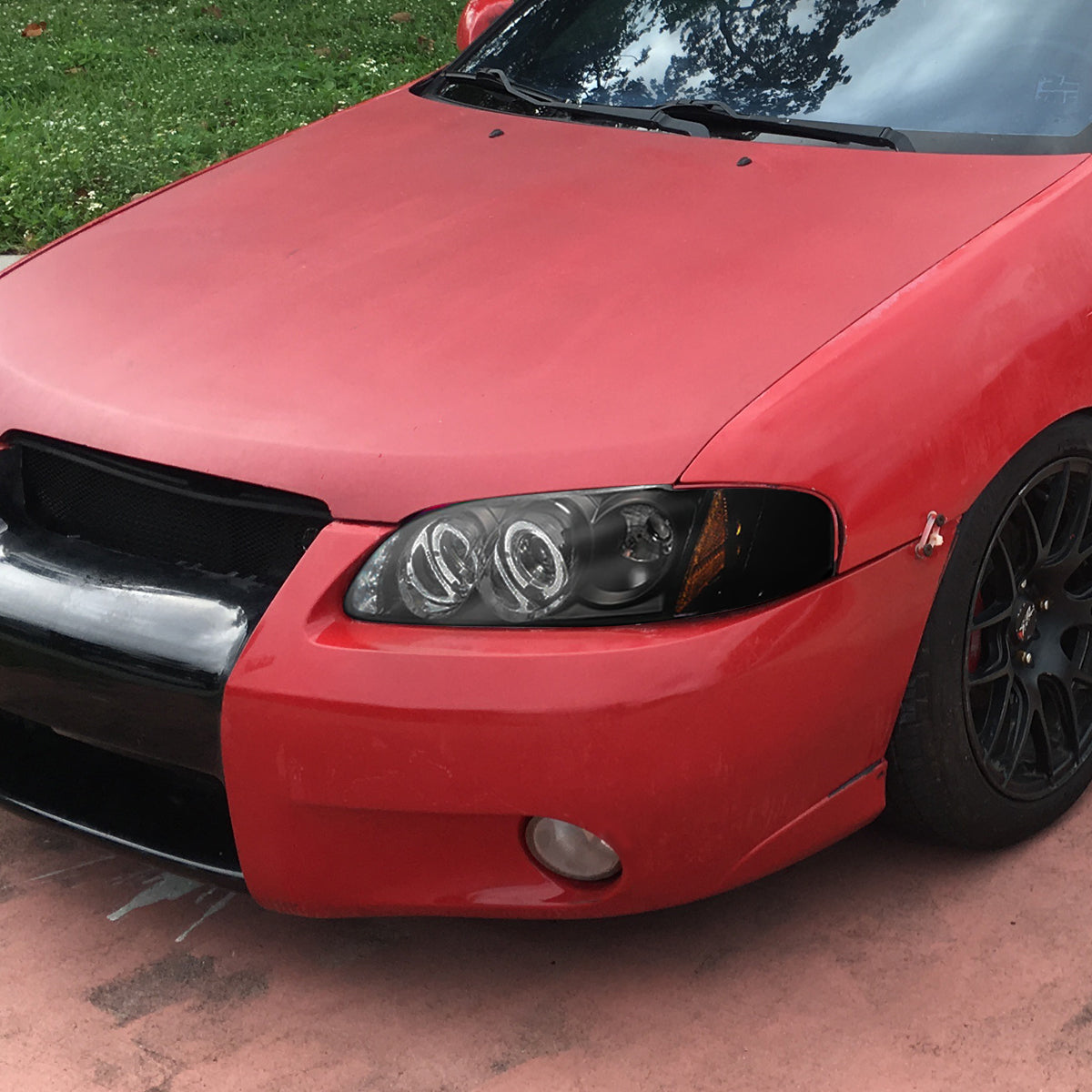 2000-2003 Nissan Sentra Dual Halo Projector Headlights (Matte Black Housing/Clear Lens)