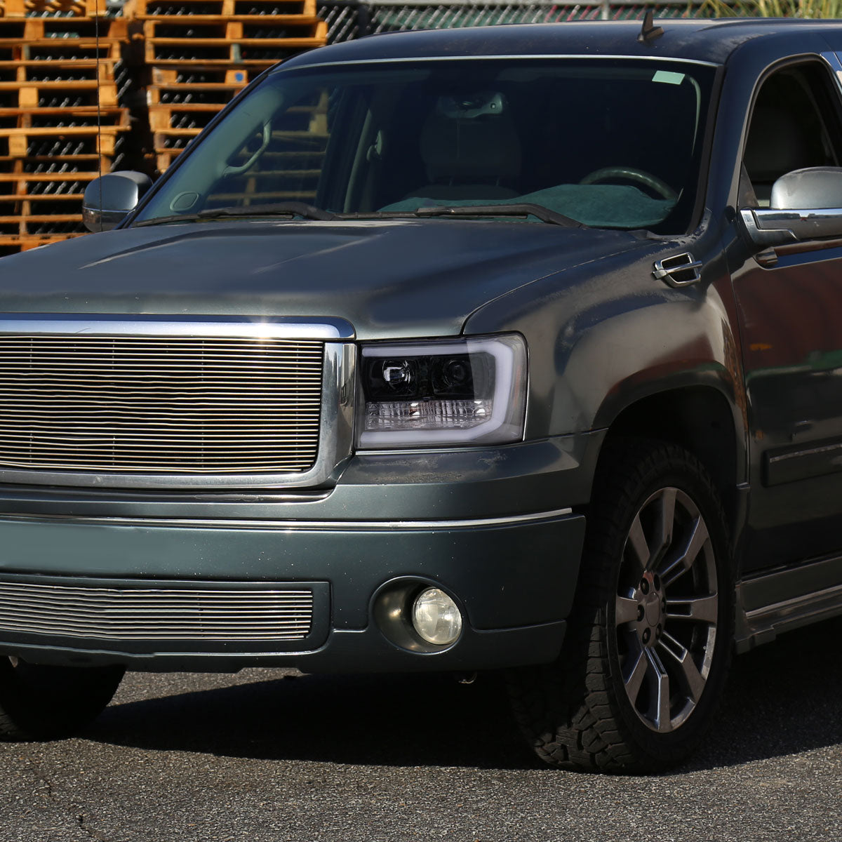 2007-2013 GMC Sierra 1500 / 2007-2014 Sierra 1500HD 2500HD 3500HD / 2009-2013 Sierra 1500 Hybrid LED C-Bar Projector Headlights (Glossy Black Housing/Smoked Lens)