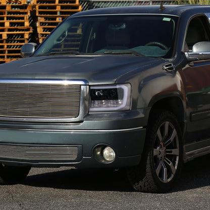 2007-2013 GMC Sierra 1500 / 2007-2014 Sierra 1500HD 2500HD 3500HD / 2009-2013 Sierra 1500 Hybrid LED C-Bar Projector Headlights (Glossy Black Housing/Smoked Lens)