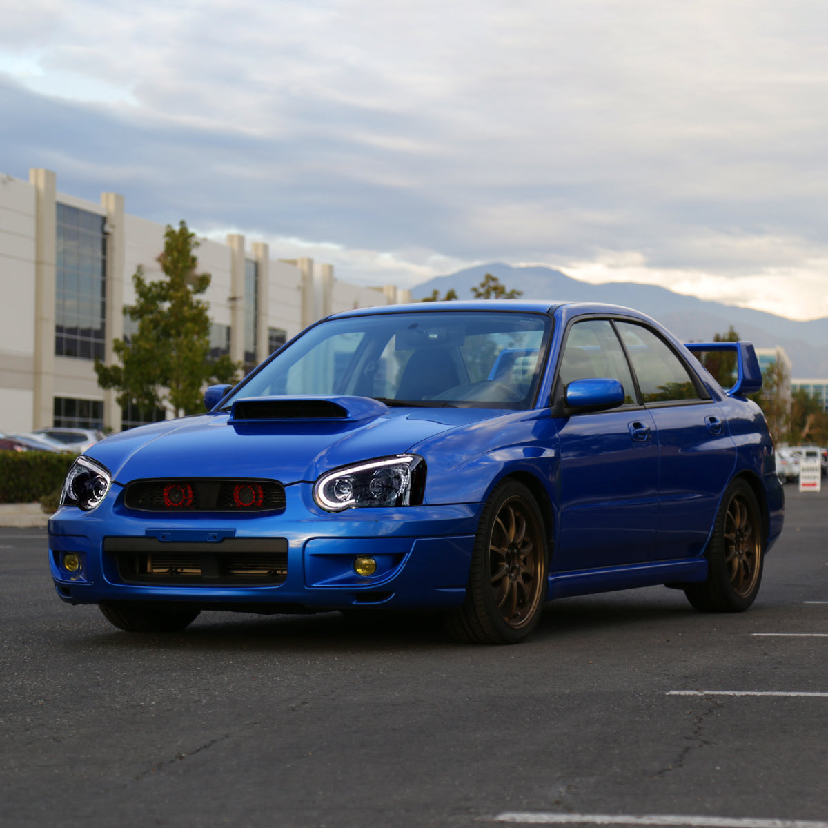 2004-2005 Subaru Impreza WRX/STI Outback Projector Headlights w/ LED Light Bar (Glossy Black Housing/Smoked Lens)