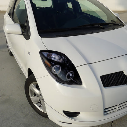 2006-2008 Toyota Yaris Dual Halo Projector Headlights (Glossy Black Housing/Smoked Lens)