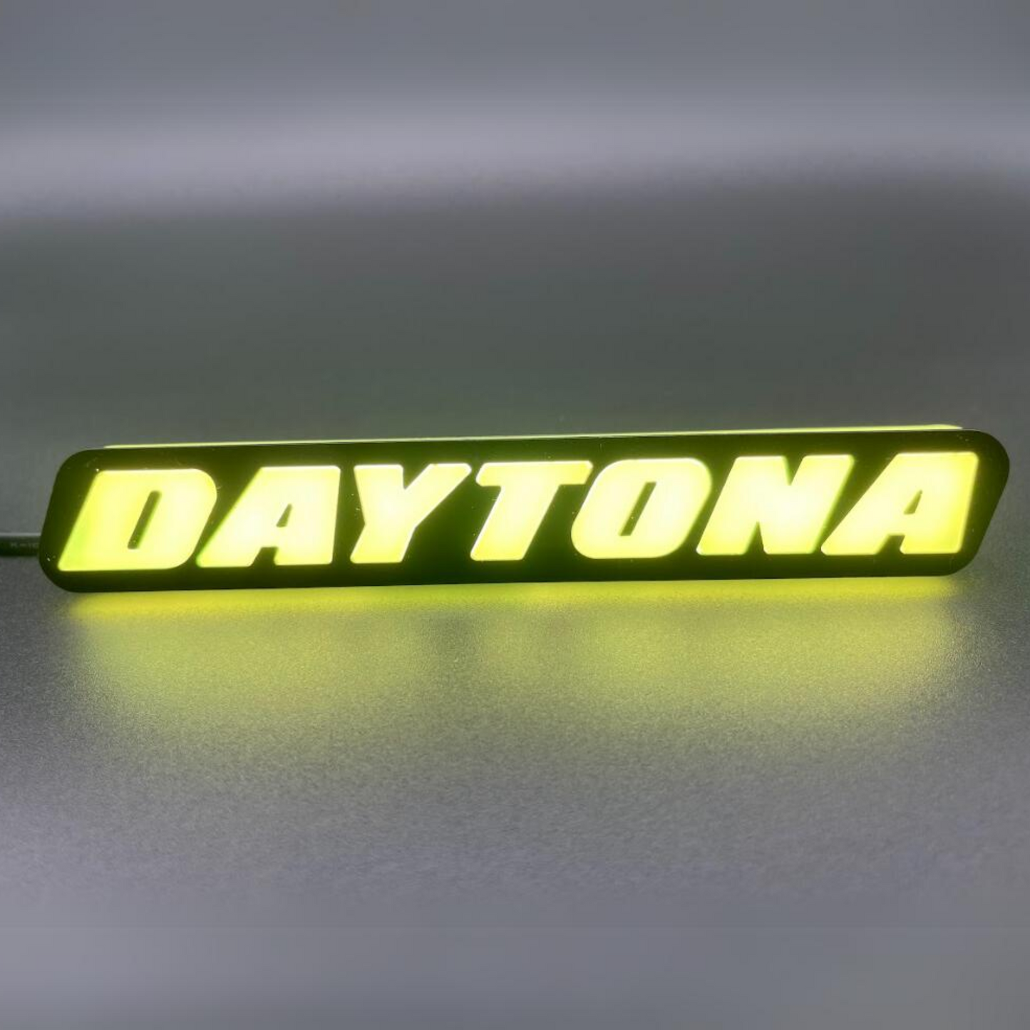 Daytona LED Badge: (Multicolor Flow)