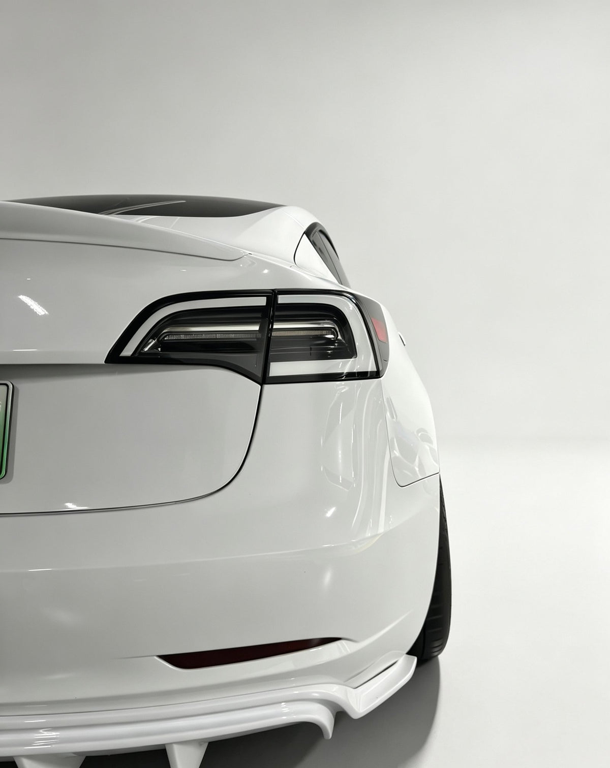 Tesla (Previous Gen) clear white-housing tail lights by JIEAN Lights – photo 1
