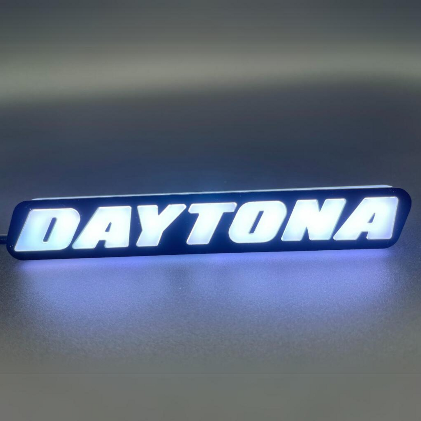 Daytona LED Badge: (Multicolor Flow)