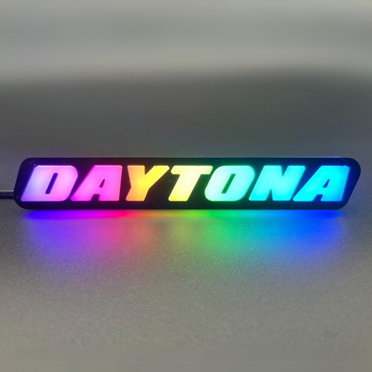 Daytona LED Badge: (Multicolor Flow)