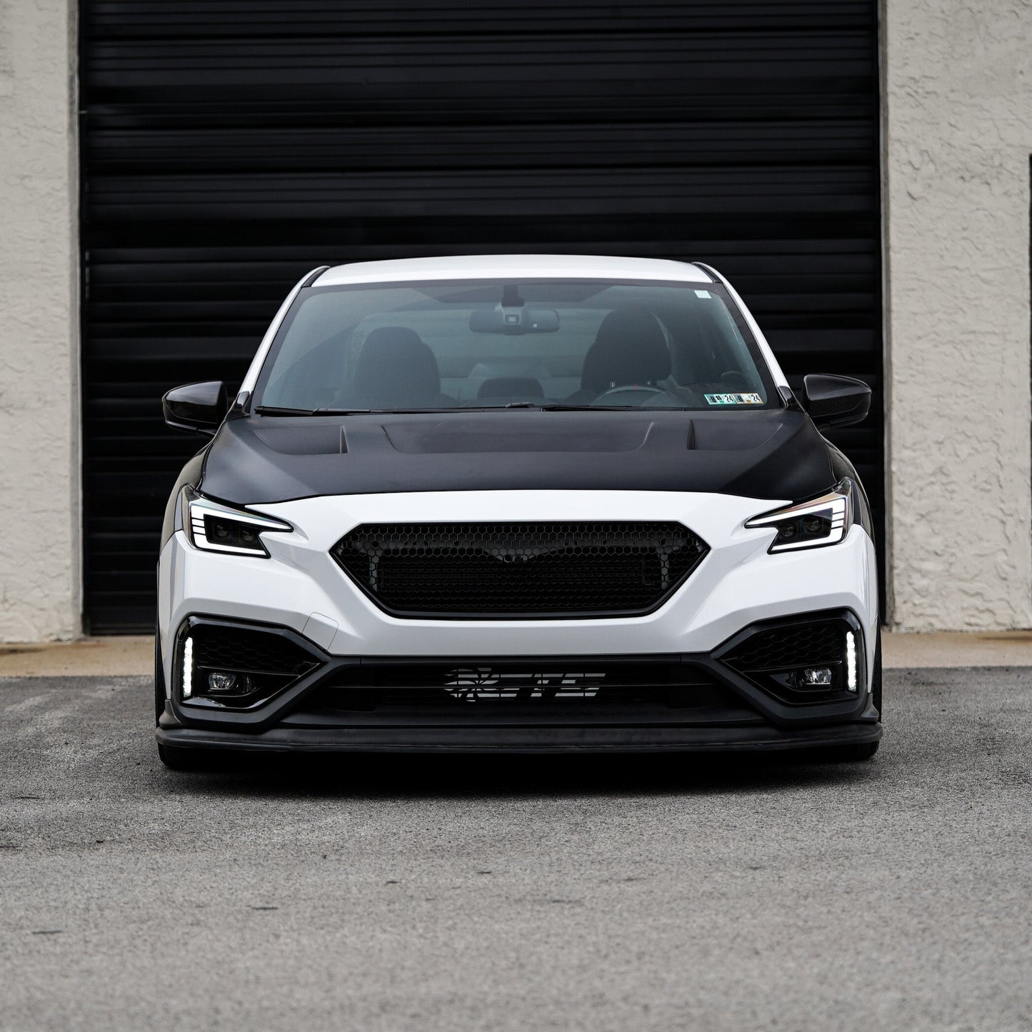 JDMuscle [22-25 WRX w/ FMIC] Carbon Fiber Scoopless Hood V1