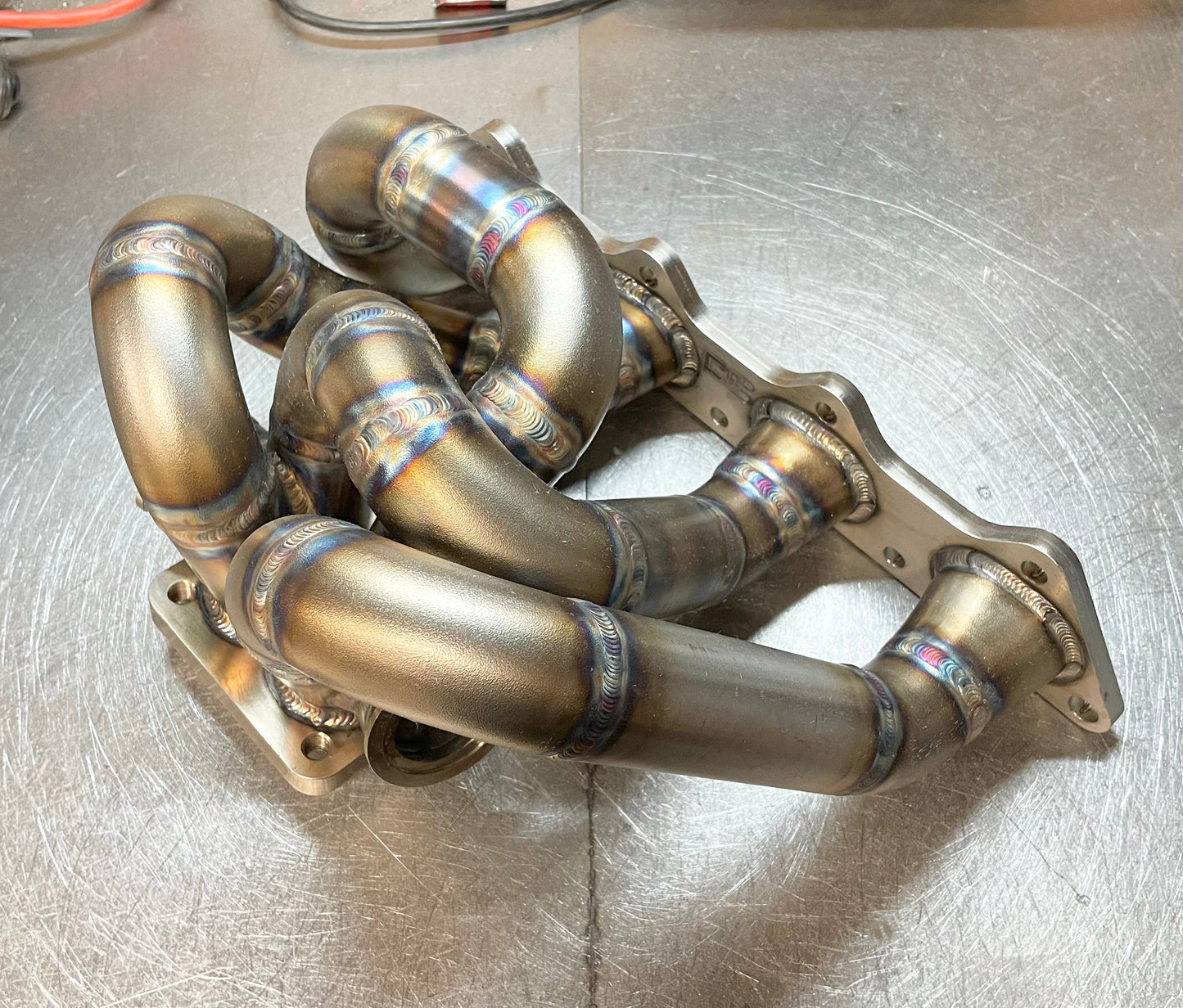 CCdesign 1G/2G DSM Divided T4 Bottom Mount Turbo Manifold