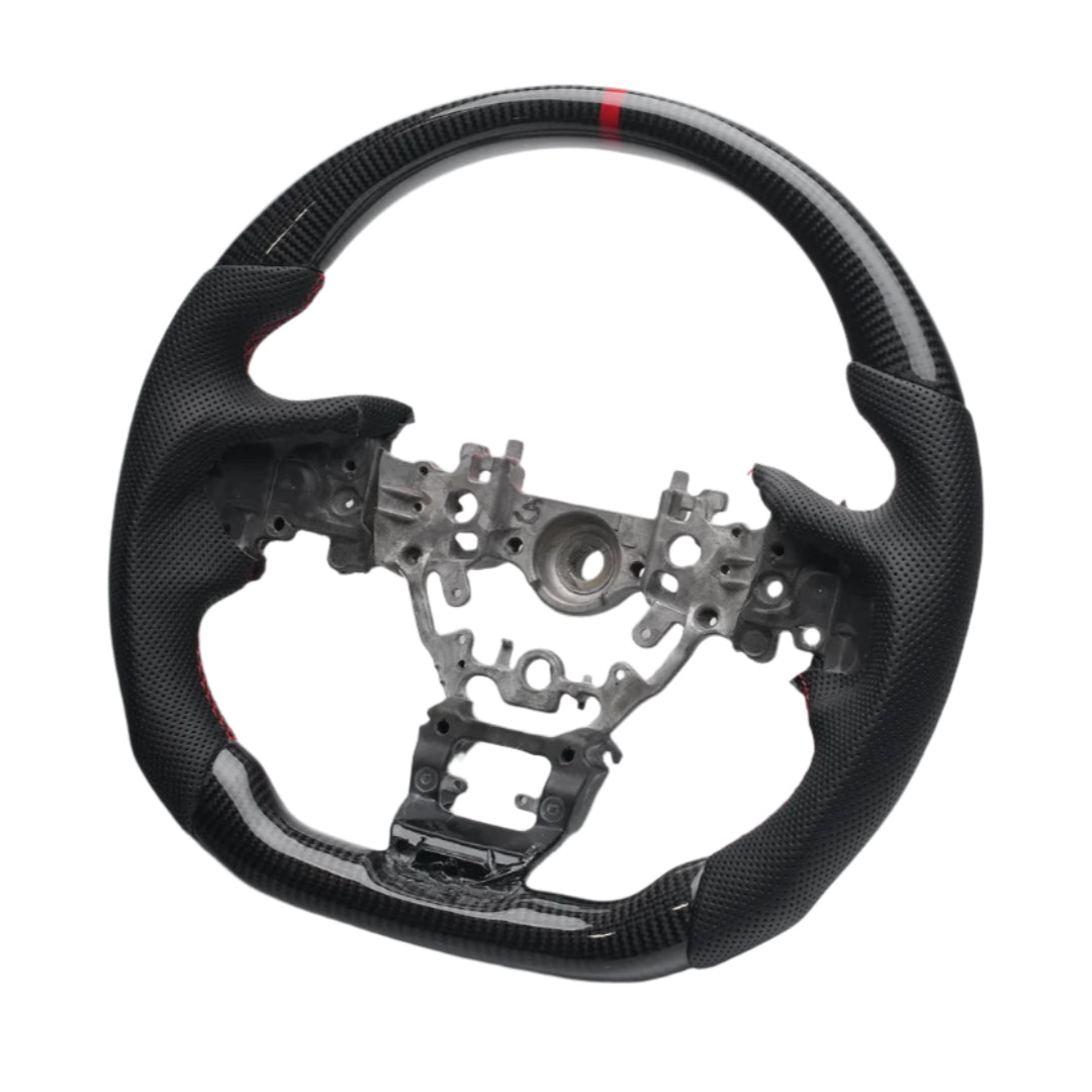 Carbon fiber steering wheel with metal center on a white background

