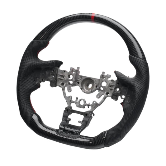 Carbon fiber steering wheel with metal center on a white background

