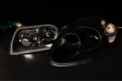 Ferrari 360 paint-ready headlight with unpainted plastic bezel