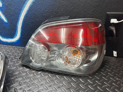 JDM Subaru Impreza WRX STi Outback Sport Wagon RS TS Tail Lights Lamps 2004-2007 (DAMAGED)