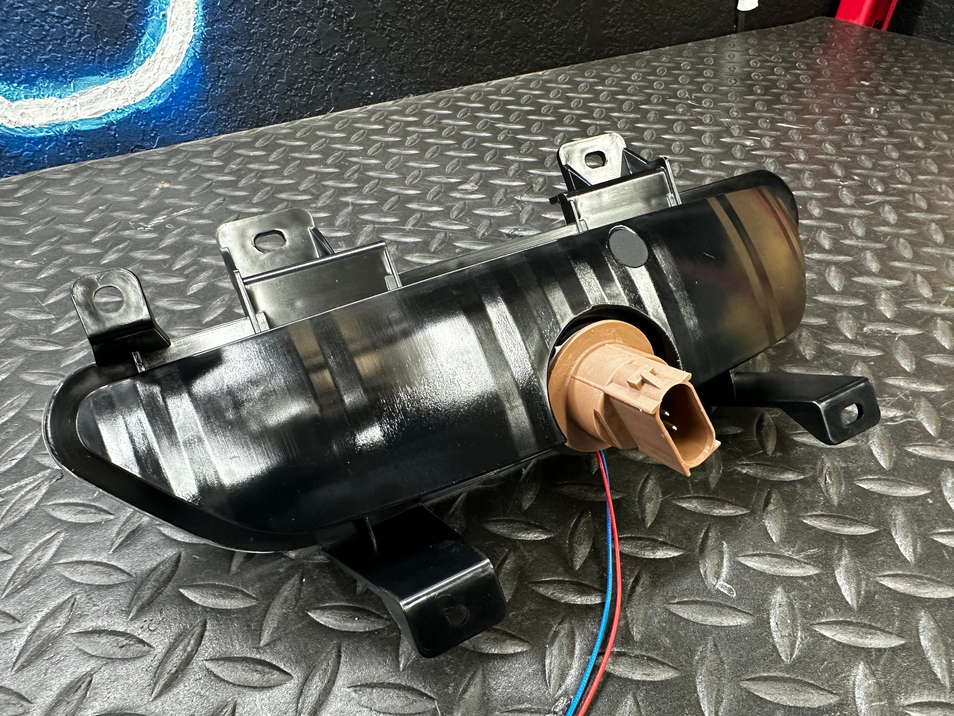 Close-up of NTXGlow clear LED reverse light for Ford Mustang S550