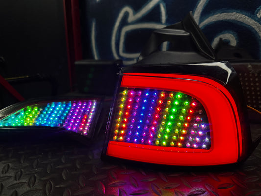 Tesla Model 3 RGB tail lights – outer and trunk lights illuminated in multicolor