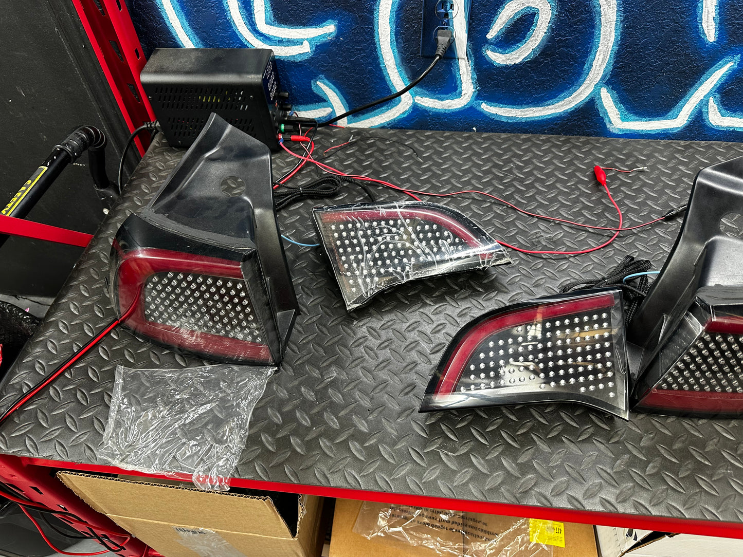 Tesla Model 3 RGB tail lights – bench-tested on power supply, film on lenses
