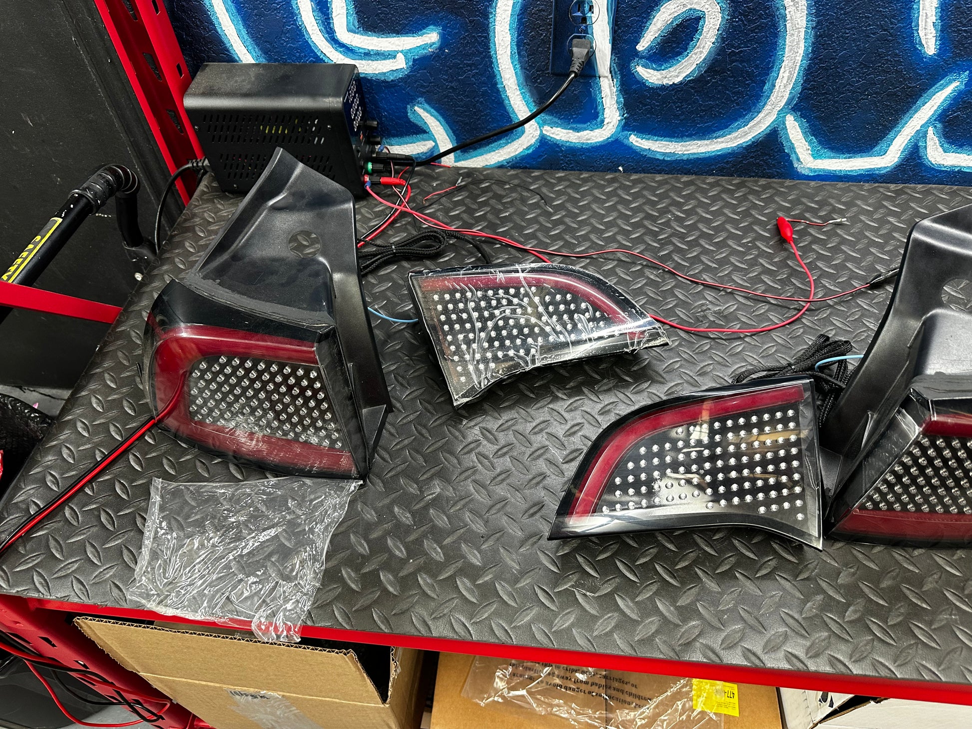 Tesla Model 3 RGB tail lights – bench-tested on power supply, film on lenses