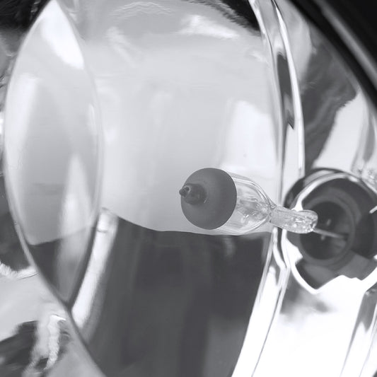 2002-2009 GMC Envoy 12V/27W Fog Lights (Chrome Housing/Clear Lens)