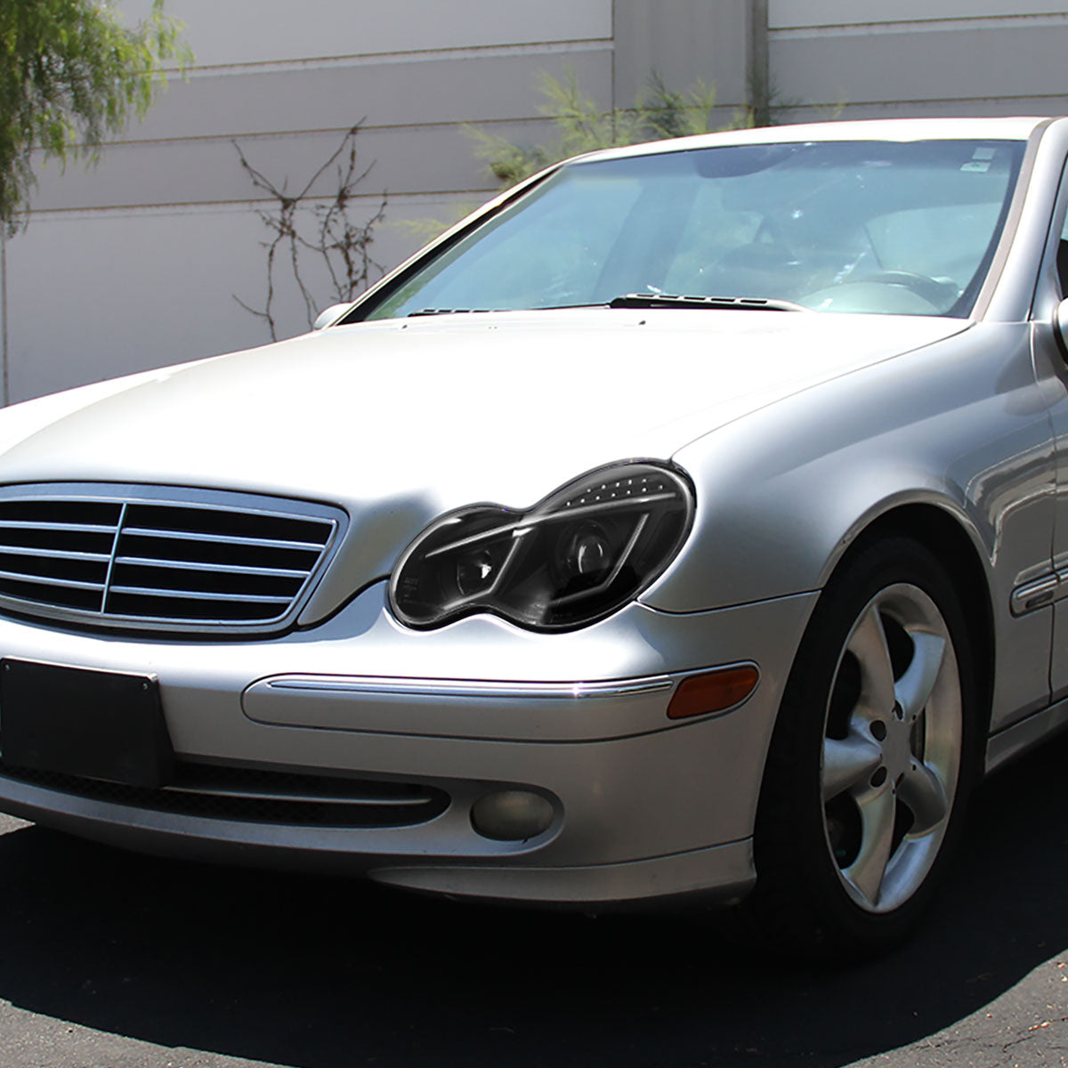 2001-2007 Mercedes Benz W203 C Class Sedan Projector Headlights w/ LED Light Bar & LED Turn Signal Lights (Matte Black Housing/Clear Lens)