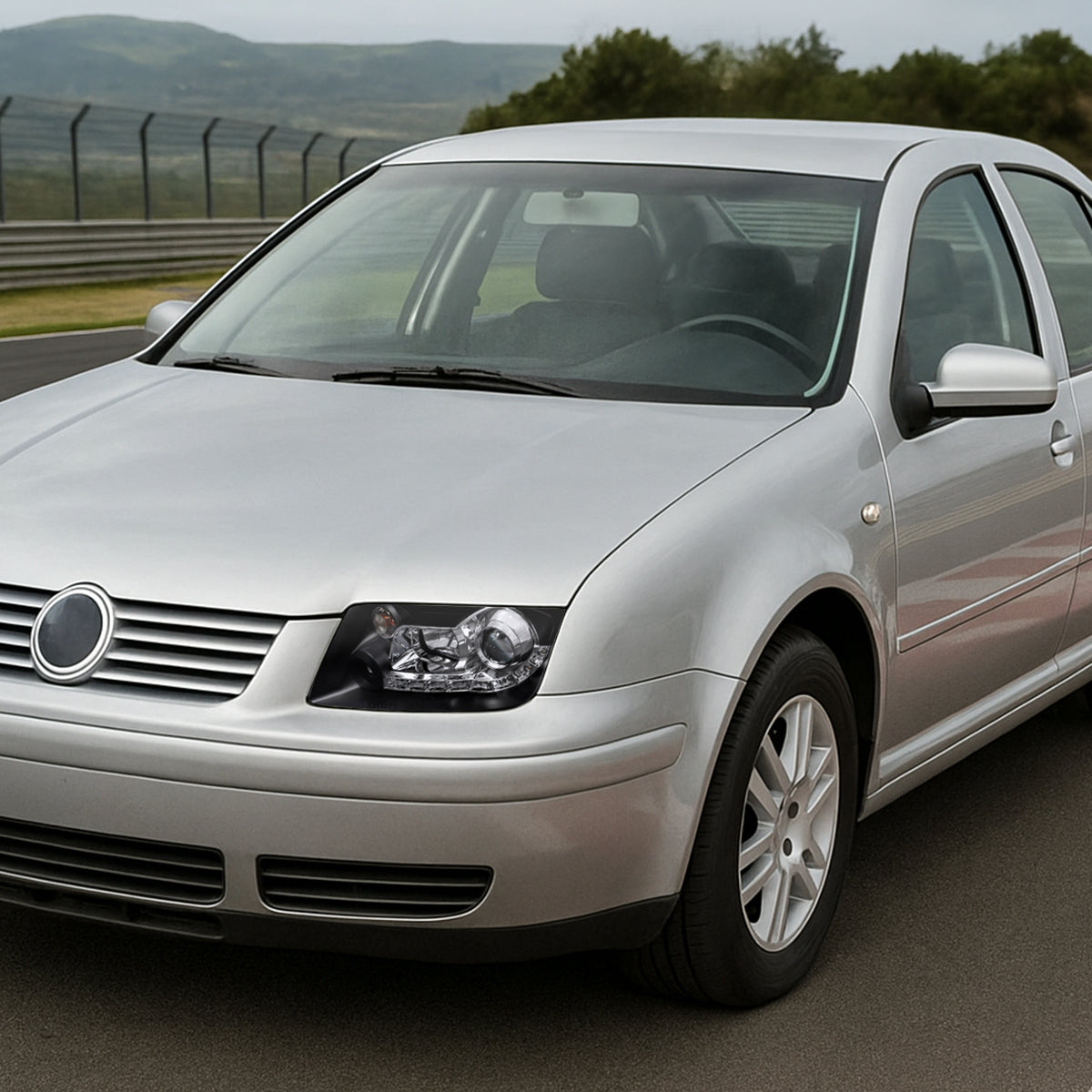 1999-2004 Volkswagen Jetta/Bora Projector Headlights w/ R8 Style LED Light Strip (Matte Black Housing/Clear Lens)