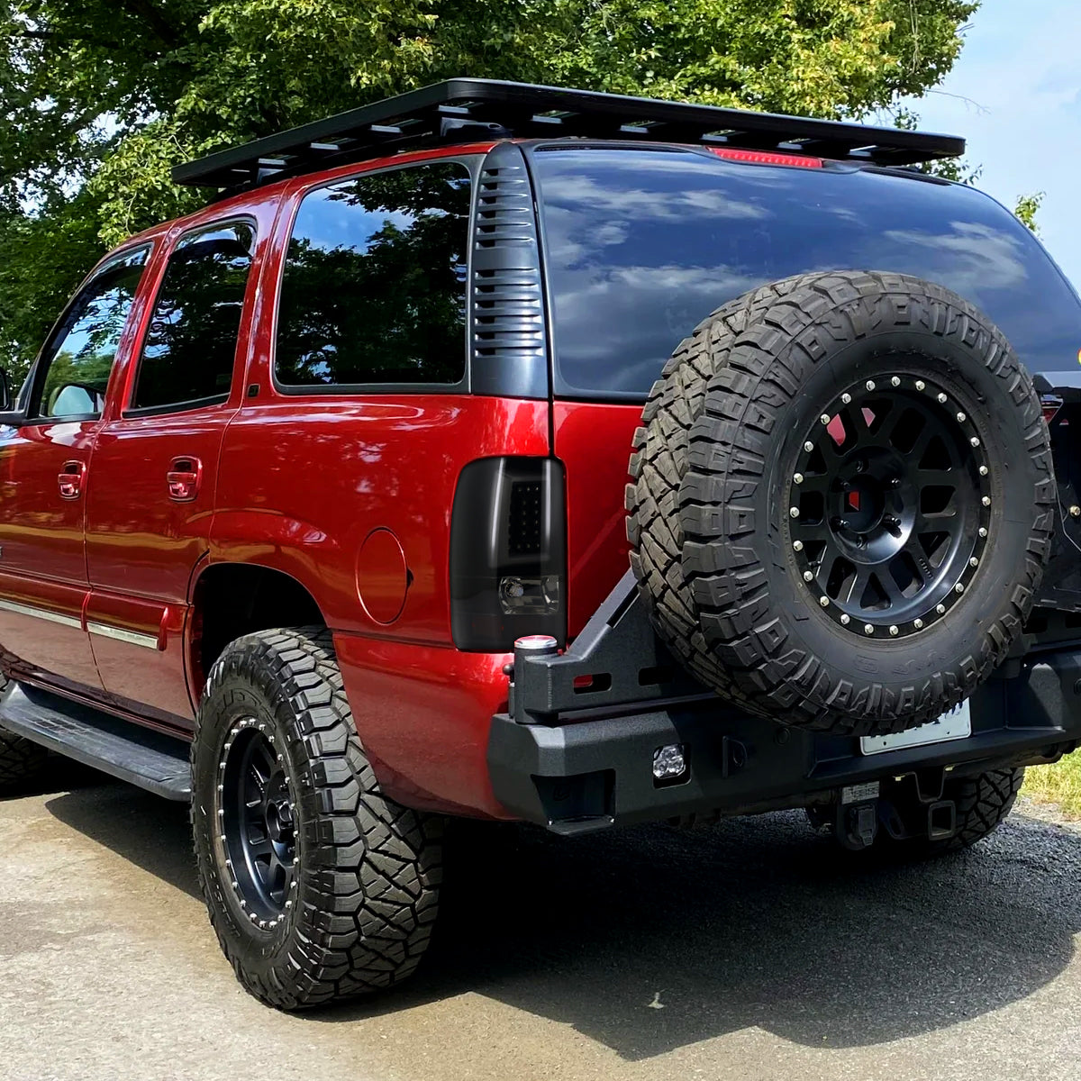 2000-2006 Chevrolet Suburban/Tahoe GMC Yukon/Yukon XL LED C Bar Tail Lights (Glossy Black Housing/Smoked Lens)