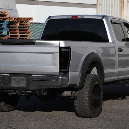 2017-2019 Ford F-250/F-350/F-450/F-550 LED Bar Tail Lights (Glossy Black Housing/Dark Smoked Lens)