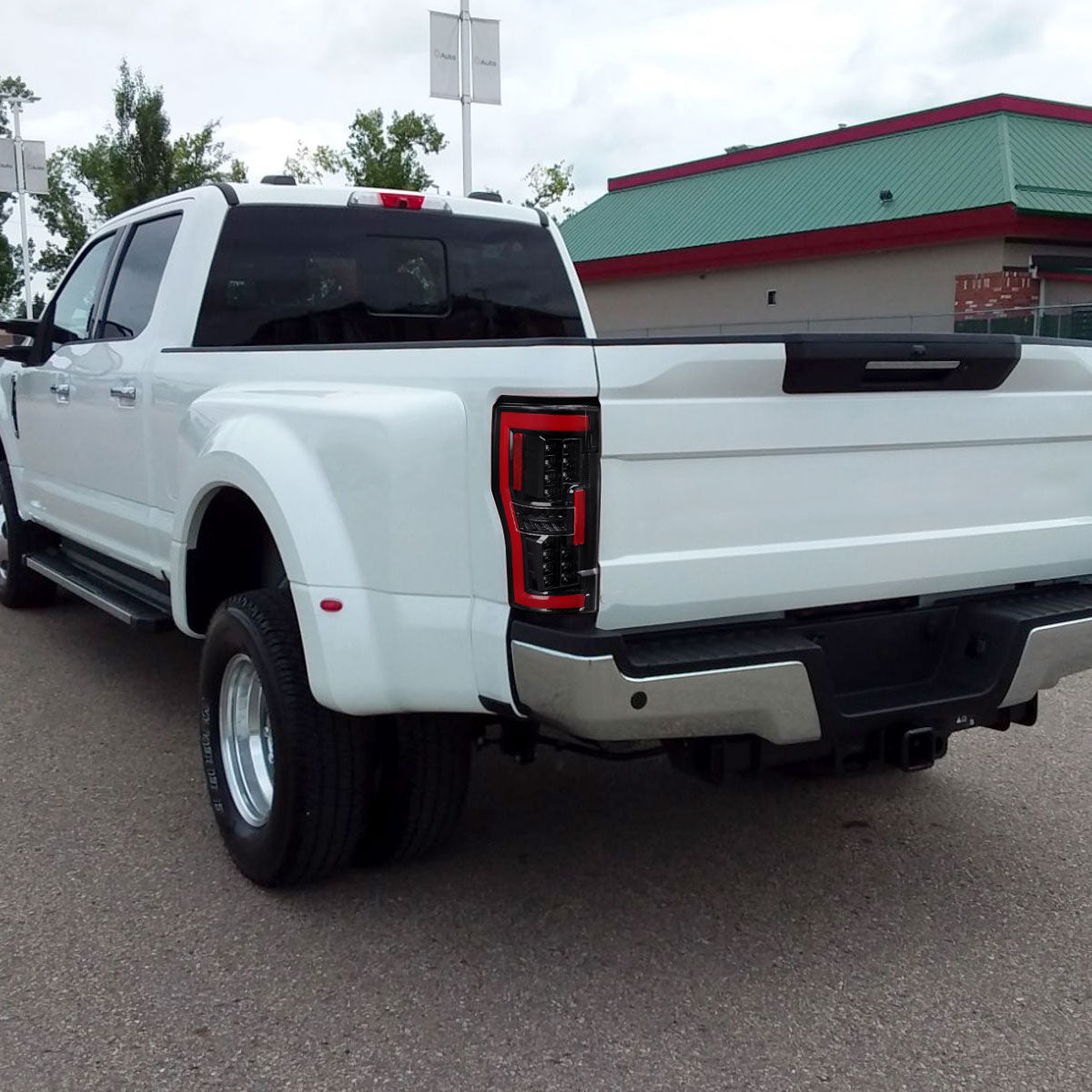 2017-2019 Ford F-250/F-350/F-450/F-550 LED Bar Tail Lights (Jet Black Housing/Clear Lens)