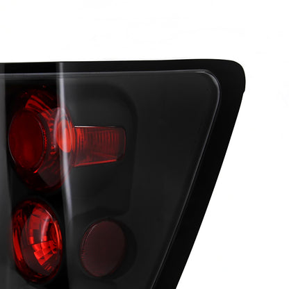 2005-2006 Jeep Grand Cherokee Tail Lights (Matte Black Housing/Clear Lens)