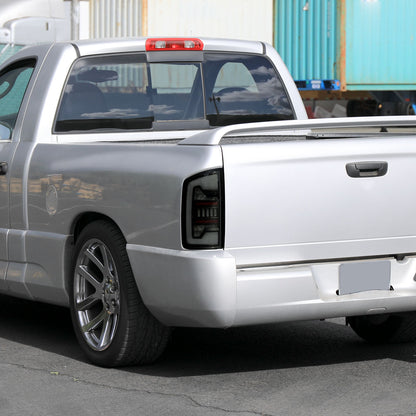 2002-2006 Dodge RAM 1500/2500/3500 White LED Bar Tail Lights (Matte Black Housing/Smoked Lens)