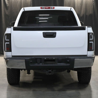 2007-2013 Chevrolet Silverado 1500/ 2007-2014 Silverado 2500HD/3500HD LED Tail Lights with White LED Bar (Matte Black Housing/Clear Lens)