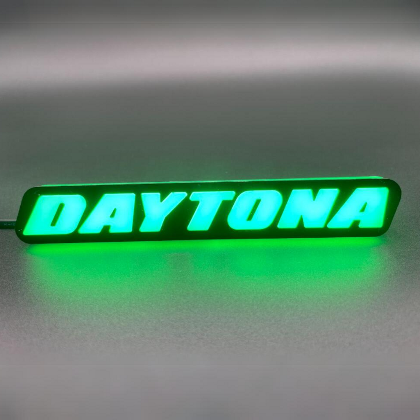 Daytona LED Badge: (Multicolor Flow)
