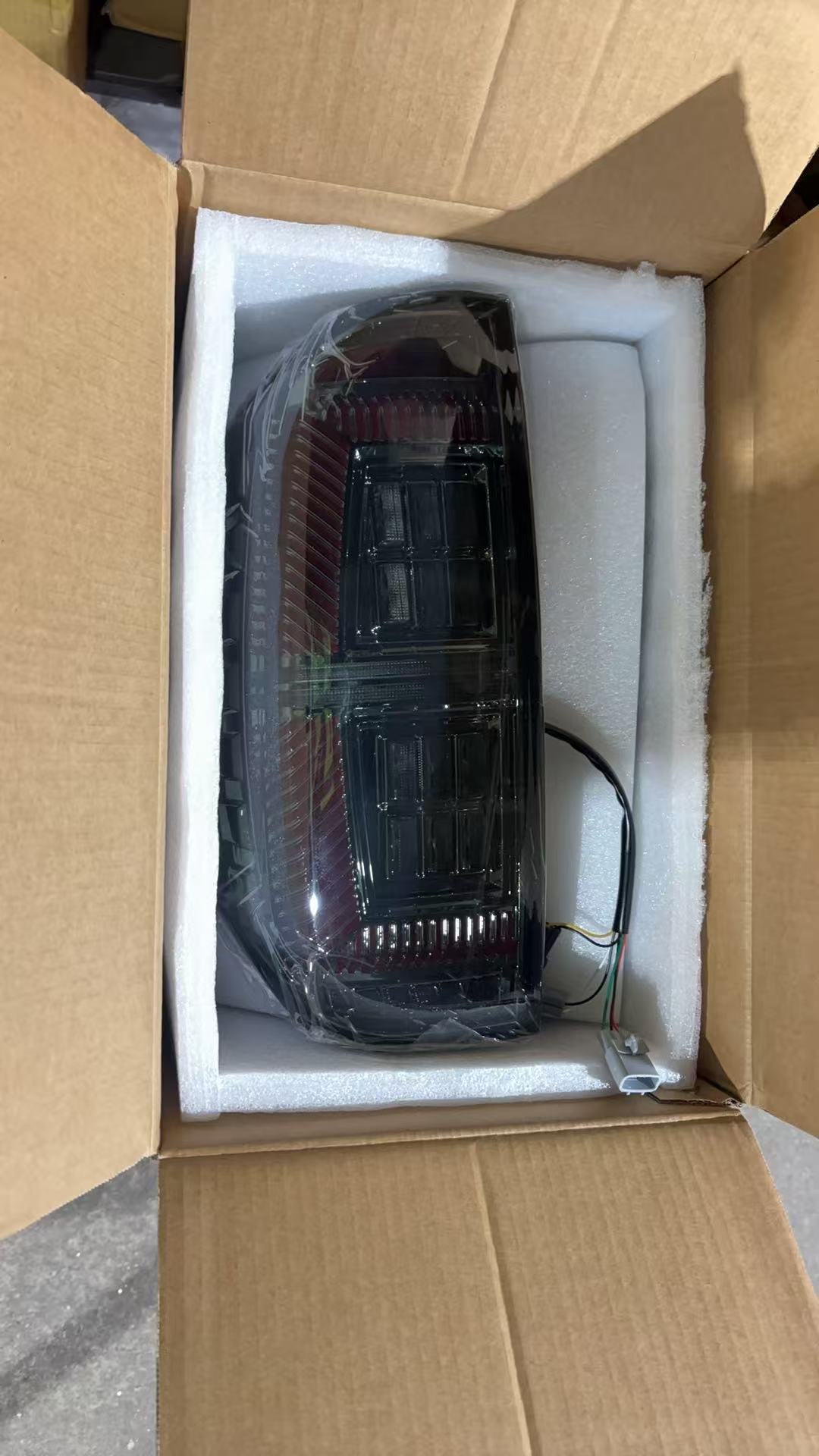 Open box Toyota Tundra 14-21 tail light - actual condition photo