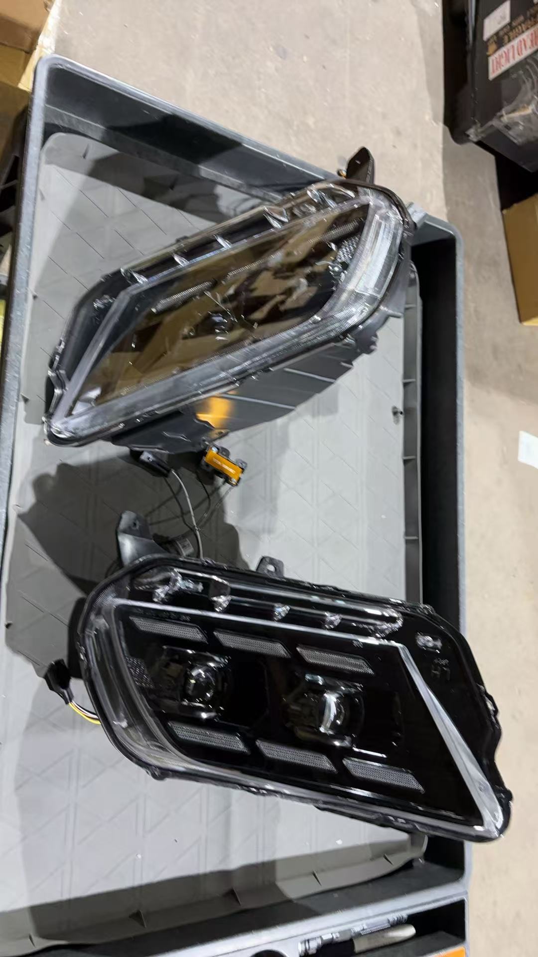 Open box 10-12 and 13-14 Mustang headlight - actual condition photo