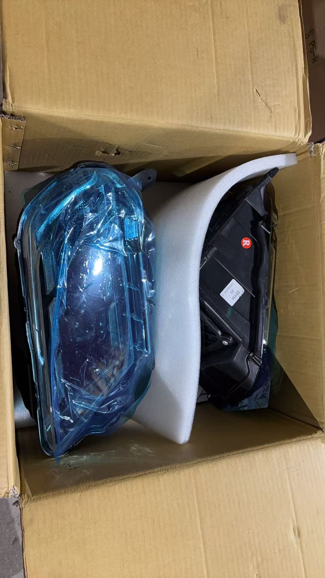 Open box 10-12 and 13-14 Mustang headlight - actual condition photo